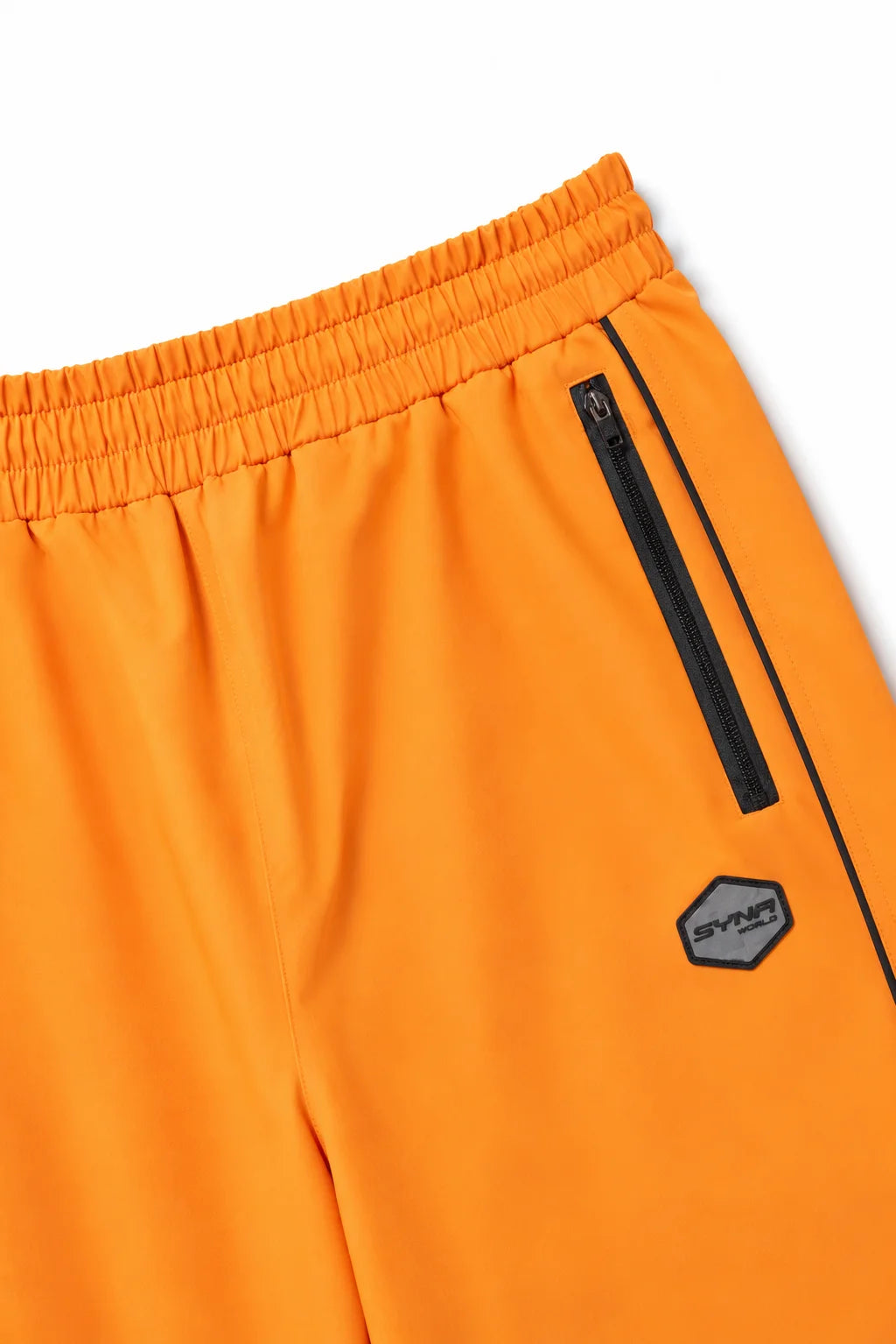 Syna World Track Pants Orange | Shell Tracksuit Bottoms — Syna World